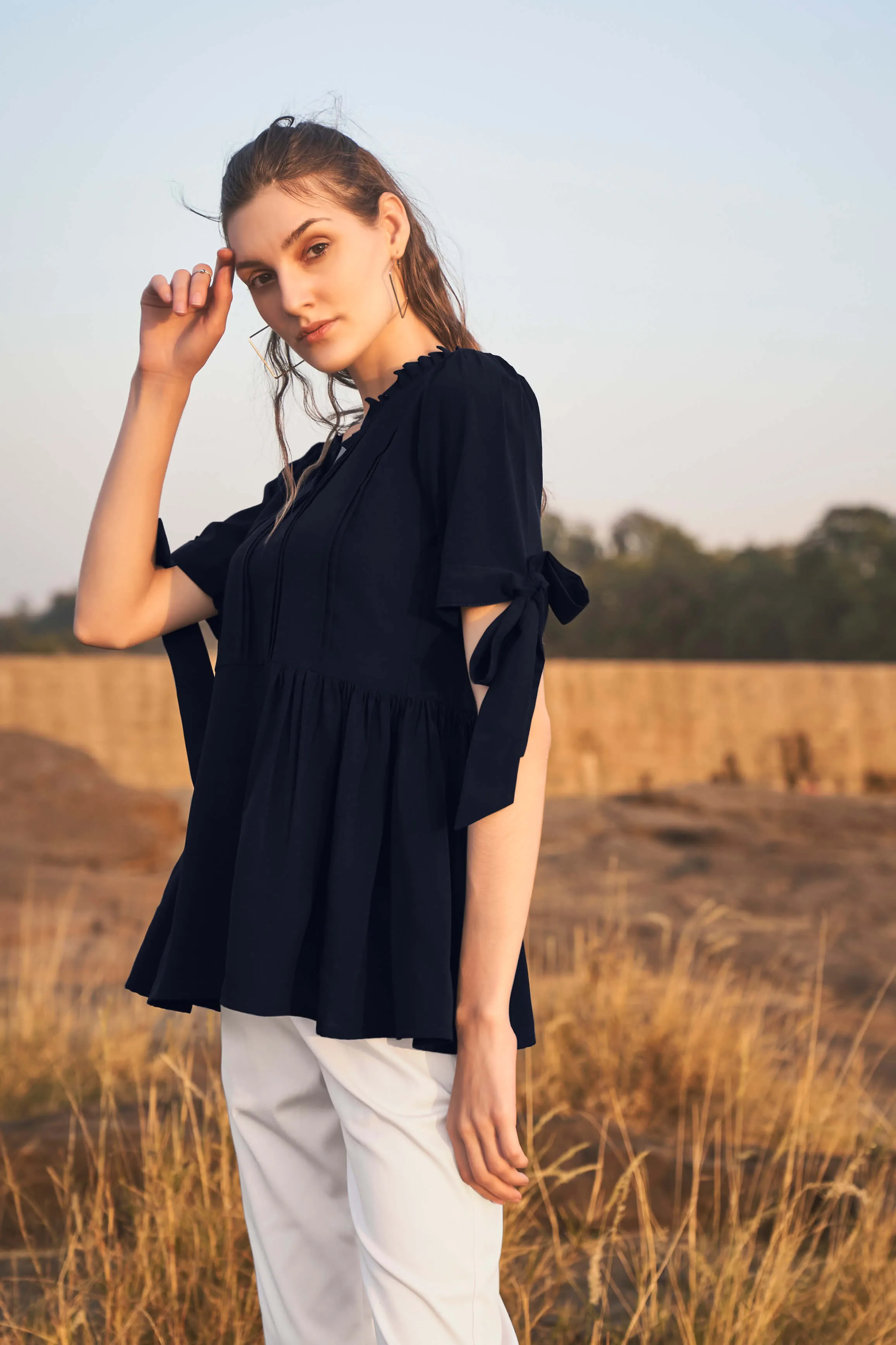 Navy Knotted Sleeve Ruffle Neck Peplum Top